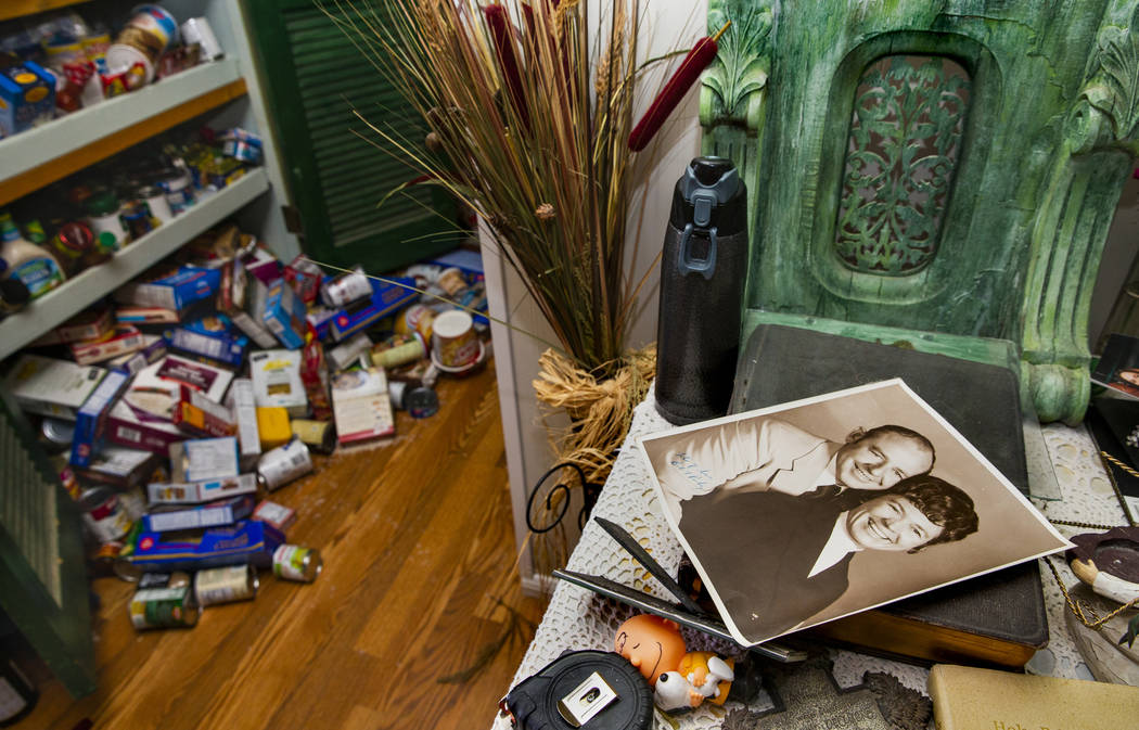 The pantry items are strewn about the floor inside the Zana Eisenhour and her husband Charlie&# ...