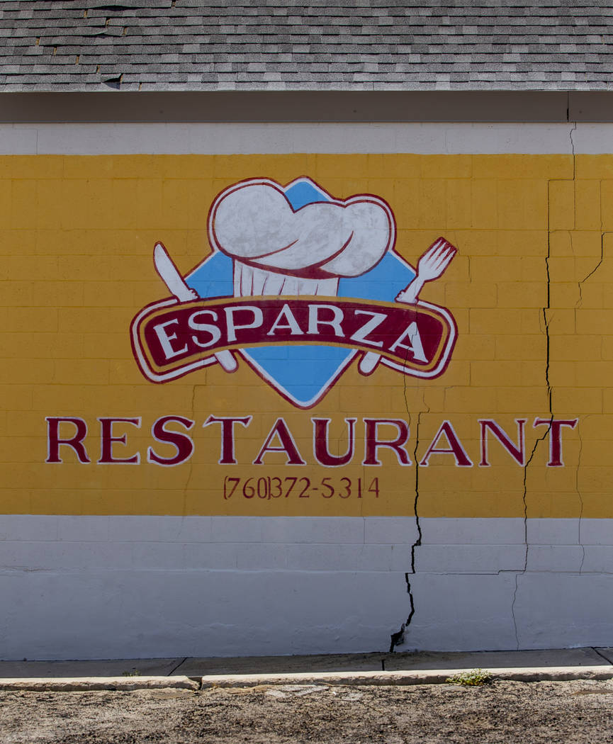 Major foundation cracks and a lack of utilities have shut down many businesses like the Esparza ...