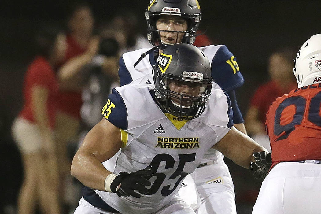 Northern Arizona offensive lineman Malik Noshi (65) in the first half during an NCAA college fo ...