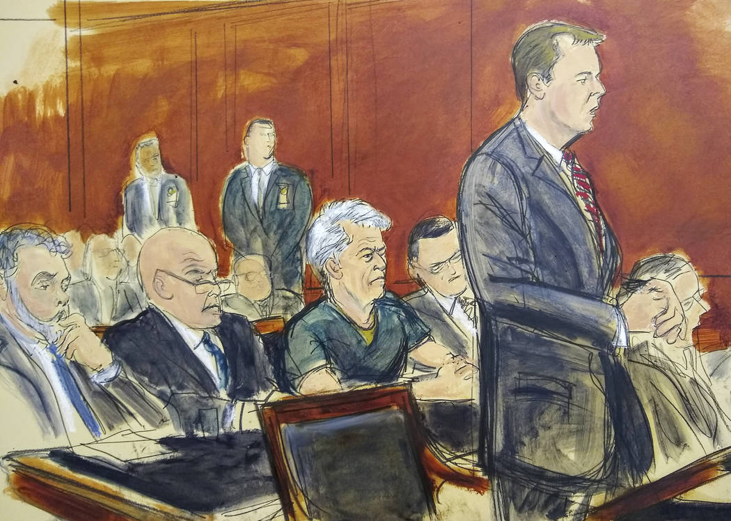 In this courtroom artist's sketch, defendant Jeffrey Epstein, center, listens as Assistant U.S. ...
