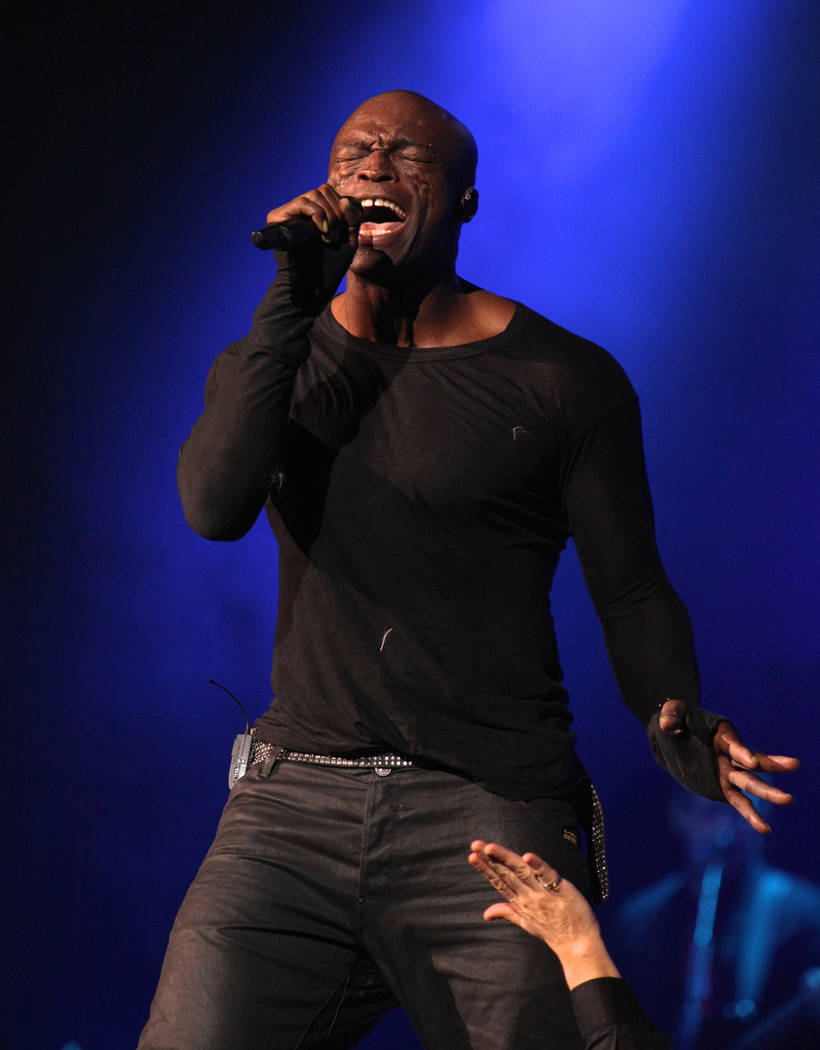 British singer Seal performs on the stage during his concert in Kiev, Ukraine, Friday, Nov. 23, ...