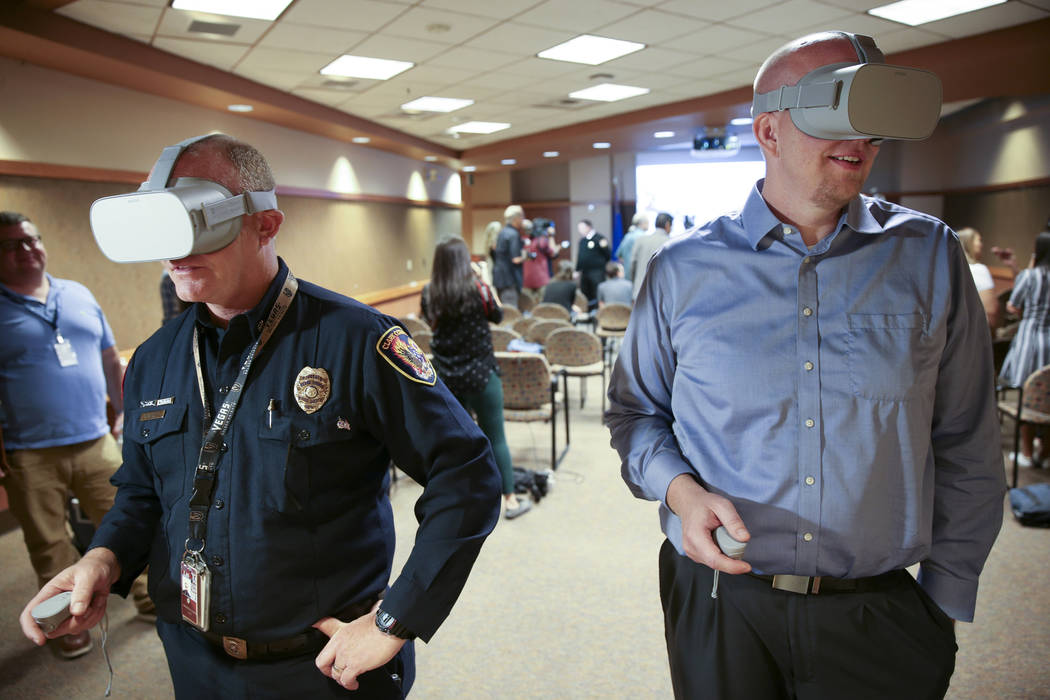 Clark County Fire Department Chief Greg Cassell, left, and Mike Warnick, a senior engineer with ...