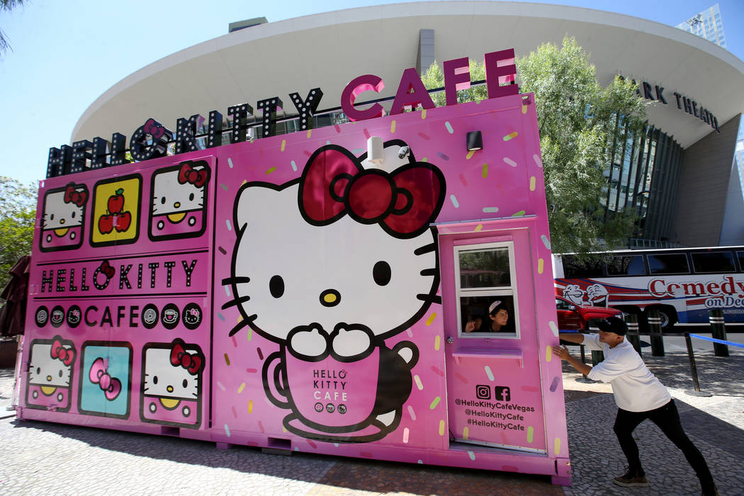 Hello Kitty Cafe owner Polo Nguyen, right, and Business