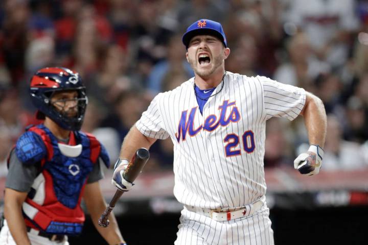 Pete Alonso, of the New York Mets, reacts during the Major League Baseball Home Run Derby, Mond ...