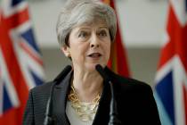 Britain's outgoing Prime Minister Theresa May delivers a speech at headquarters of Joint Forces ...