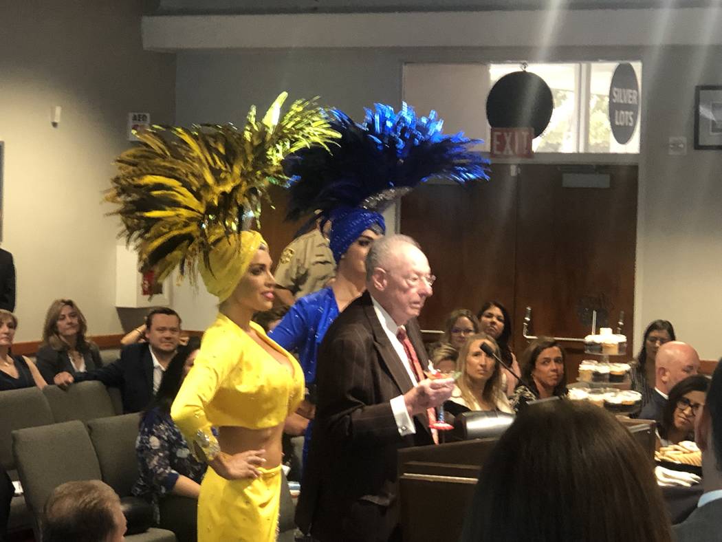 Former Las Vegas Mayor Oscar Goodman is shown with his famed showgirls as he is surprised in a ...