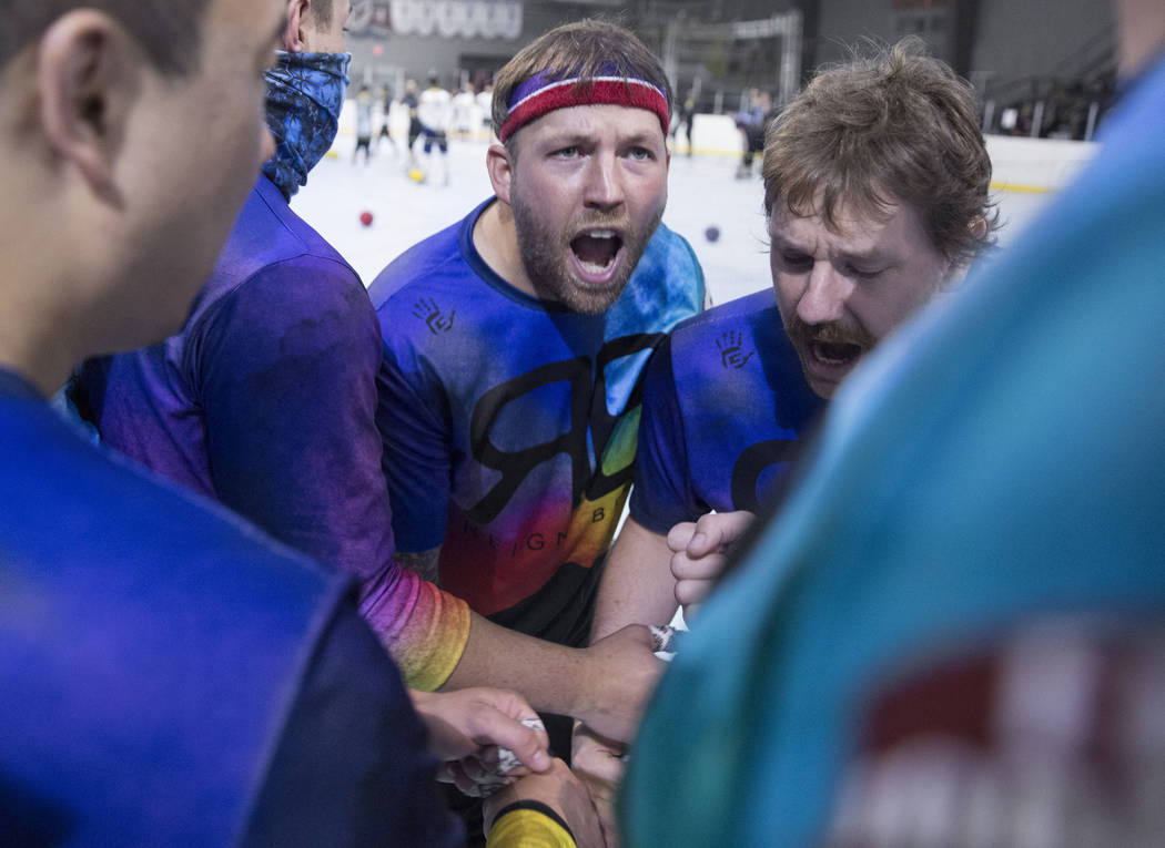 Ricky Serret, middle, fires up team Reign Bros during a two-day, five-division dodgeball tourna ...