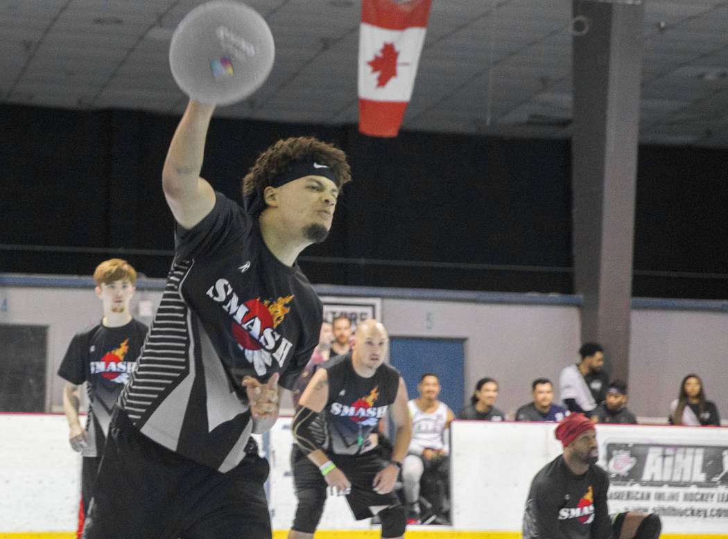 Cameron Parkey of team Smash attacks during a two-day, five-division dodgeball tournament on Sa ...