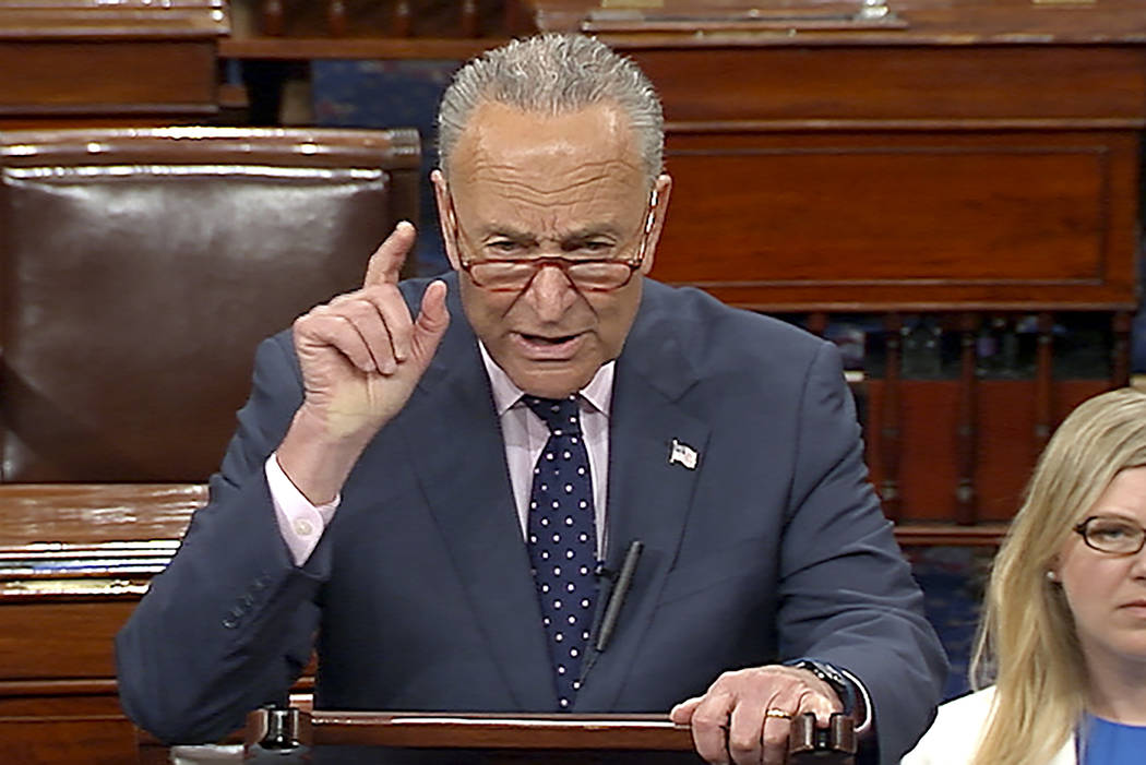 In this image from Senate Television, Senate Minority Leader Chuck Schumer, D-N.Y., talks on th ...