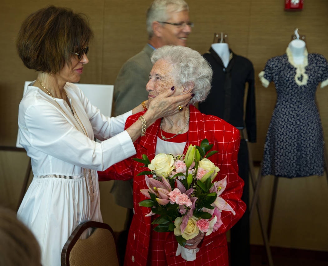 Madeleine Andress congratulates her mother-in-law Donna Andress during a renewal of vows ceremo ...