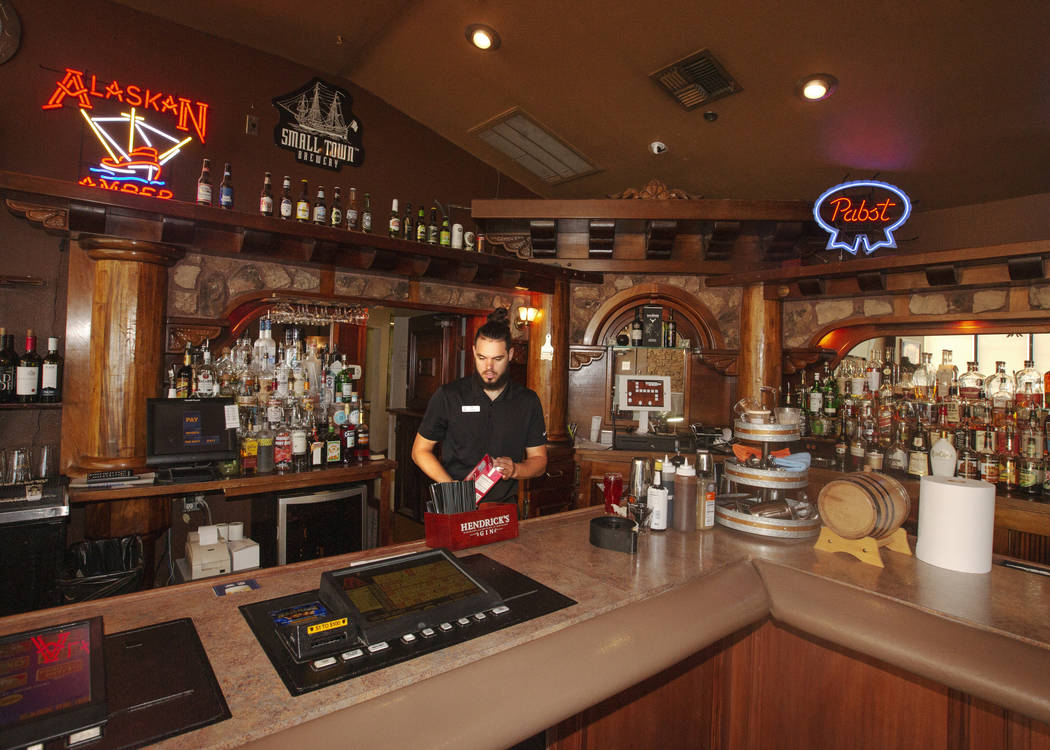 TJ Hambright makes a drink at The Resort on Mount Charleston on Wednesday, July 10, 2019 in Mou ...