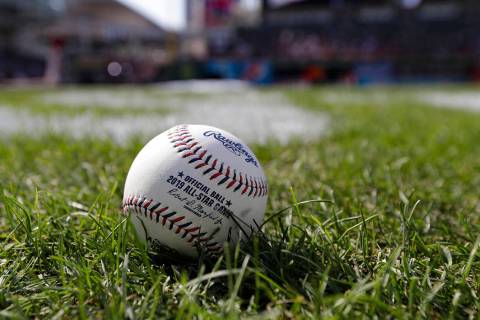 A baseball is pictured as the American League warms-up for the MLB baseball All-Star Game, Tues ...