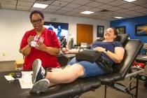 Barbara Moor, 57, prepares to draw blood from Audra Findley, during The American Red Cross bloo ...