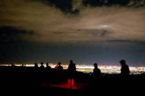 Hikers' silhouettes are seen. (Natalie Burt)