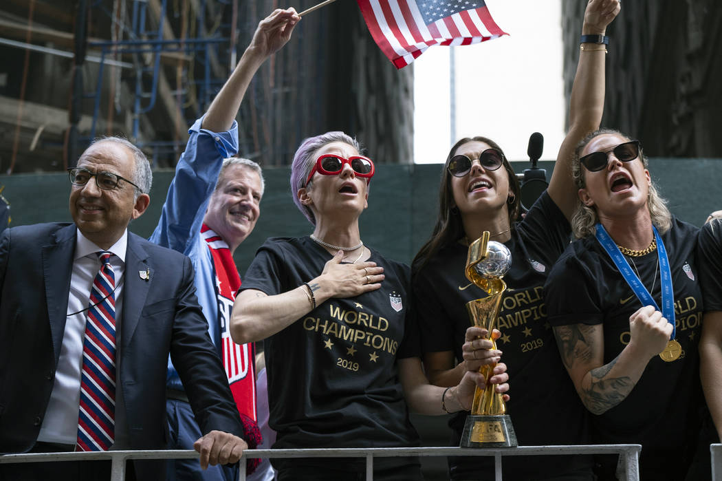 From left, U.S. Soccer Federation President Carlos Cordeiro, New York Mayor Bill de Blasio and ...