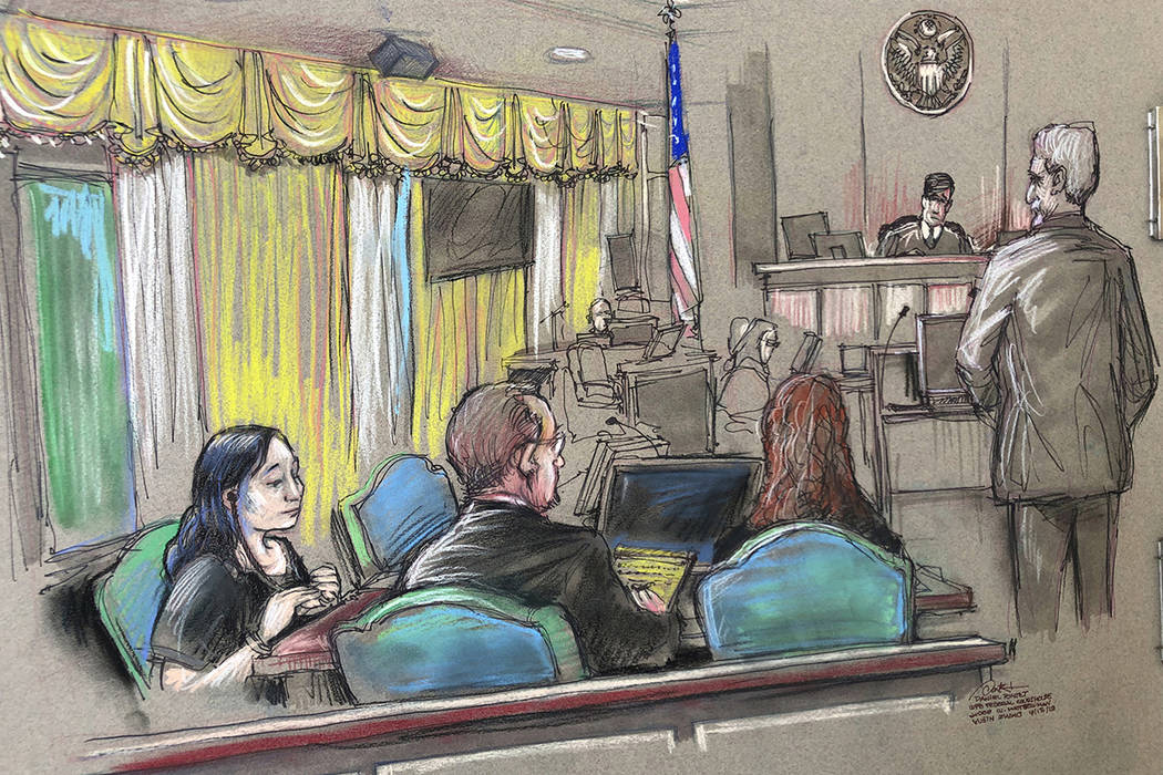 FILE - In this April 15, 2019, file court sketch, Yujing Zhang, left, a Chinese woman charged w ...