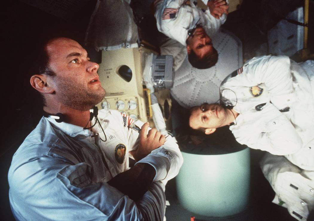 Tom Hanks, left, Kevin Bacon, center, and Bill Paxton appear in character in Universal Pictures ...