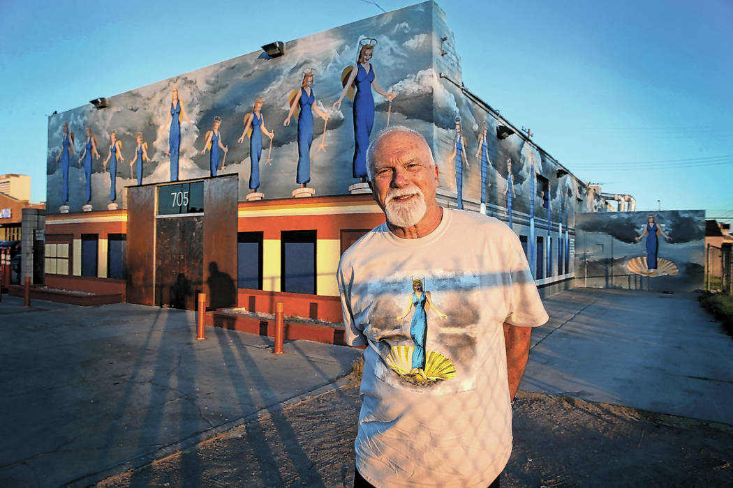 James Stanford with part of his mural, ÒA Phalanx of Angels Ascending" on the 705 Bui ...