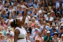 United States' Serena Williams celebrates defeating Czech Republic's Barbora Strycova during a ...