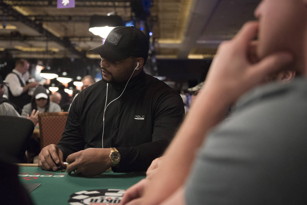 Former NFL player, Richard Seymour, plays in Flight A during Day 1A of the Main Event of the Wo ...