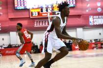 Portland Trail Blazers' Nassir Little (9) drives to the basket against the Houston Rockets duri ...