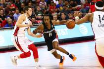 Atlanta Hawks' Tahjre McCall (8) drives to the basket against the Washington Wizards during the ...