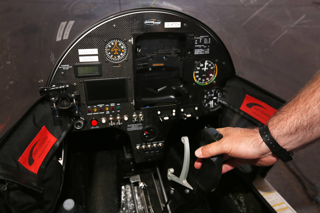 James Ketchell shows off his cockpit of his gyrocopter at Henderson Executive Airport on July 1 ...