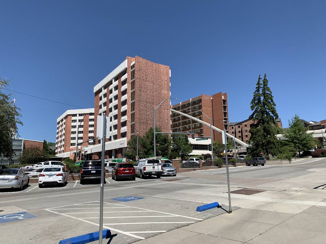 On left, Argenta Hall at University of Nevada, Reno. Two July 5 explosions blew out the first f ...
