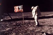 FILE - In this image provided by NASA, astronaut Buzz Aldrin poses for a photograph beside the ...