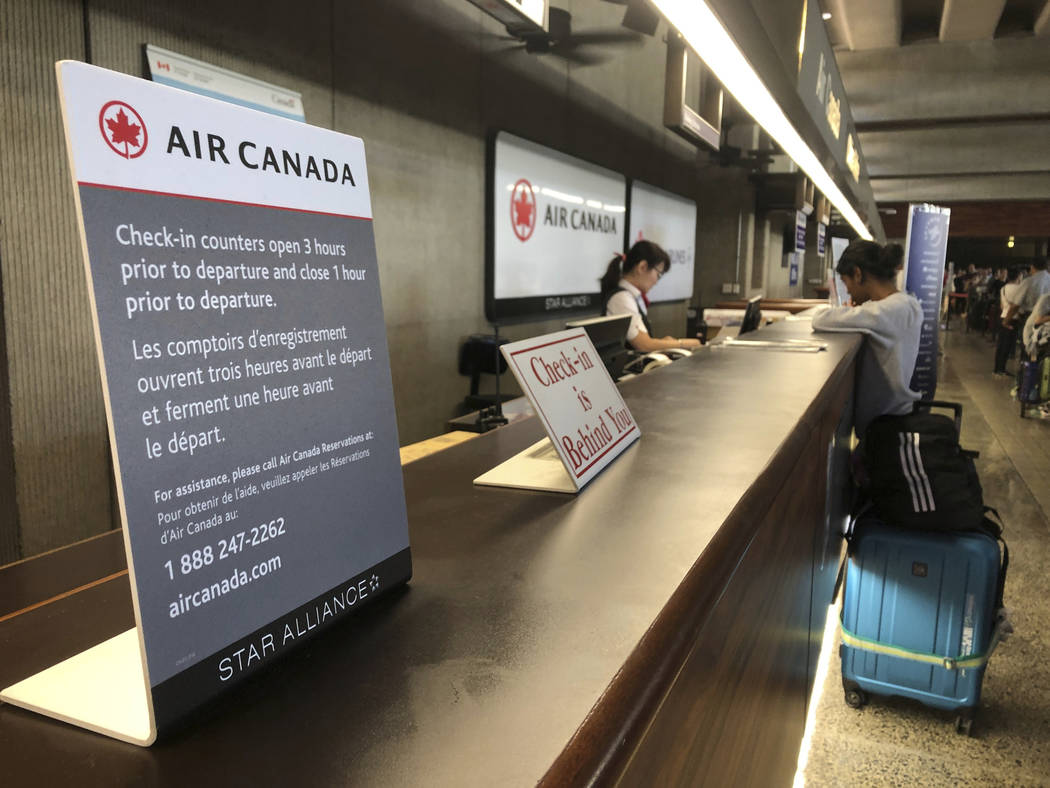 Passengers from an Australia-bound Air Canada flight diverted to Honolulu Thursday, July 11, 20 ...