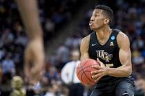 Central Florida guard Aubrey Dawkins looks to shoot against VCU during the first half of a firs ...