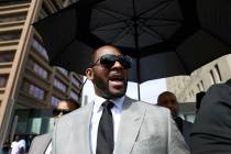 Musician R. Kelly departs the Leighton Criminal Court building after pleading not guilty to 11 ...