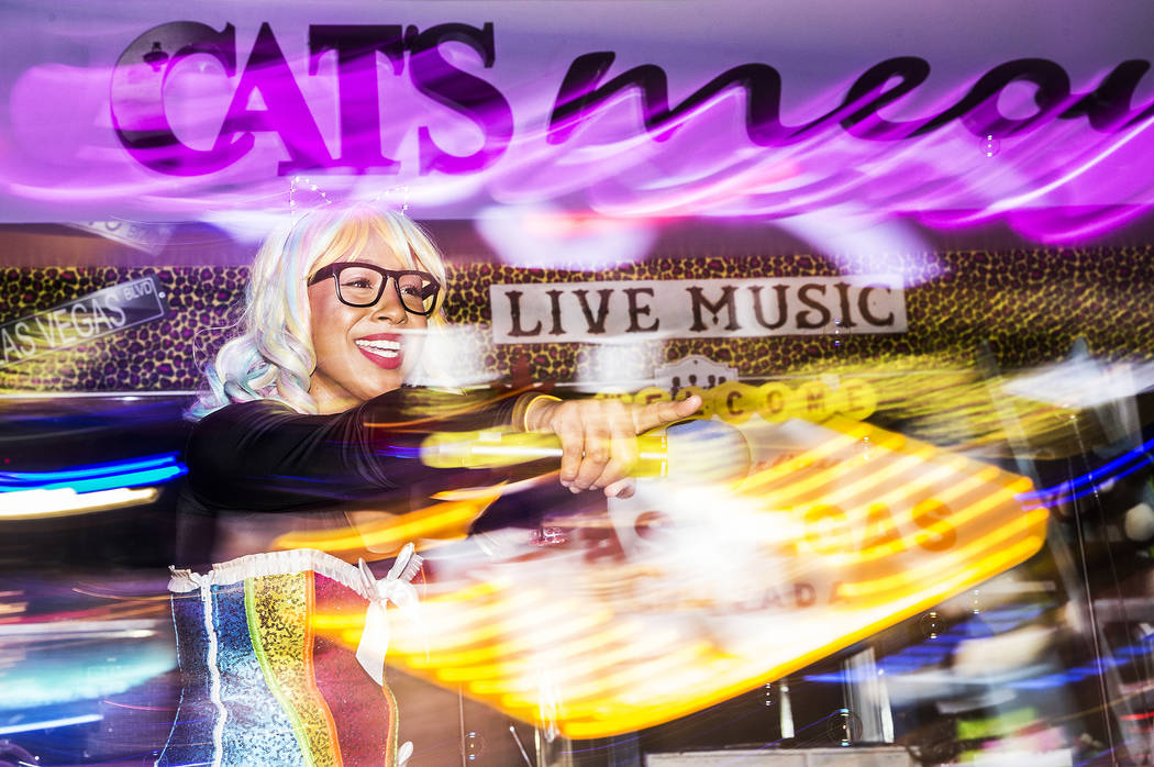 MC Primrose Martin fires up the crowd at Cat's Meow karaoke club on Friday, July 12, 2019, at N ...