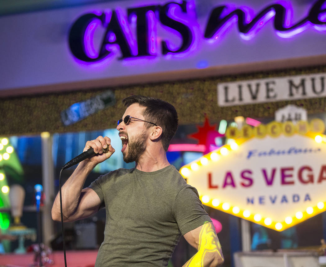 Sean Kavanaugh performs Stevie Wonder's "Superstition" at Cat's Meow karaoke club on ...