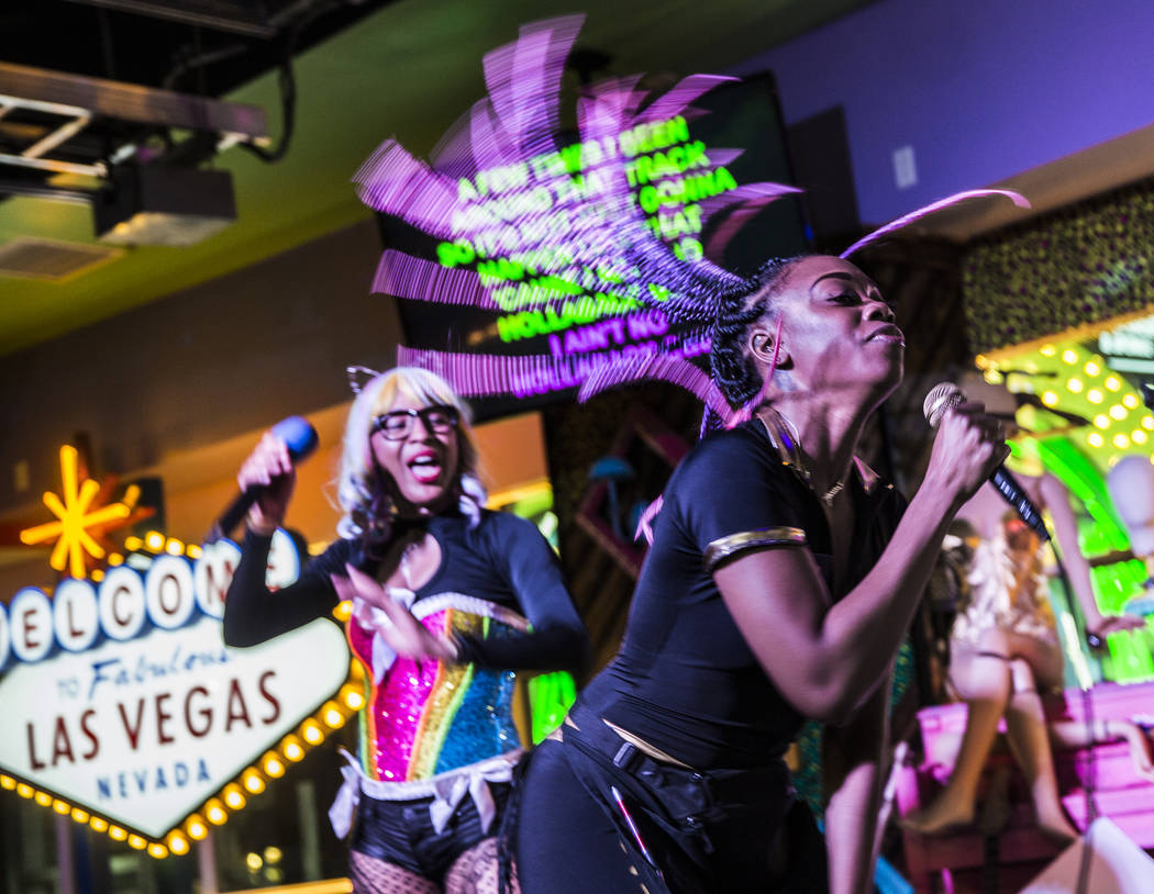 Xstal Yumi, right, and MC Primrose Martin perform Gwen Stefani's "Hollaback Girl" at ...