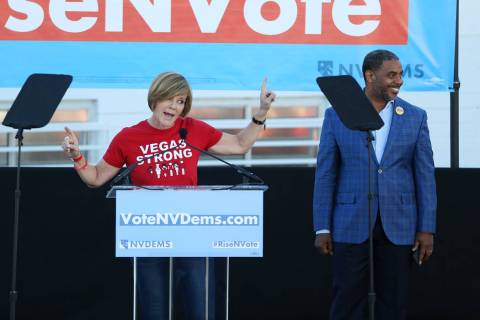 Democratic candidates for Congress Susie Lee, left, with Steven Horsford, speaks during a Nevad ...