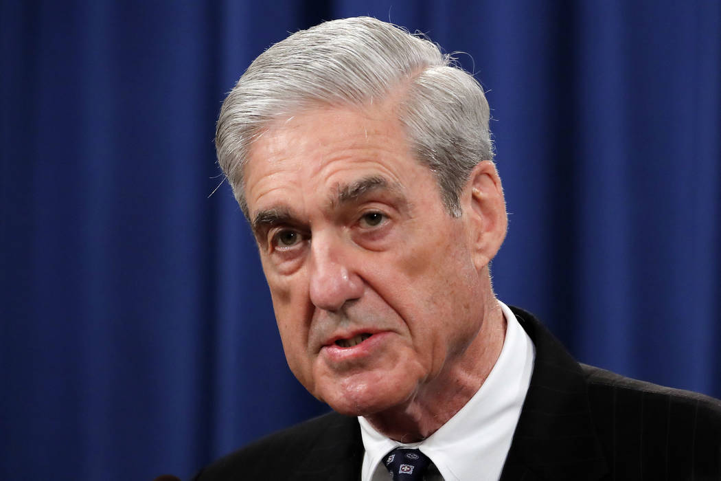 FILE - In this May 29, 2019, file photo, Special counsel Robert Mueller speaks at the Departmen ...