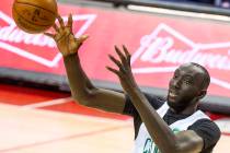 Boston Celtics center Tacko Fall looks in a rebound over the Memphis Grizzlies during the secon ...