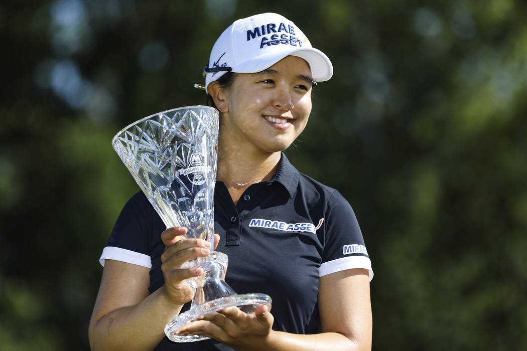 Sei Young Kim holds the trophy after winning the Marathon LPGA Classic tournament on Sunday Jul ...