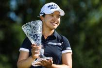Sei Young Kim holds the trophy after winning the Marathon LPGA Classic tournament on Sunday Jul ...