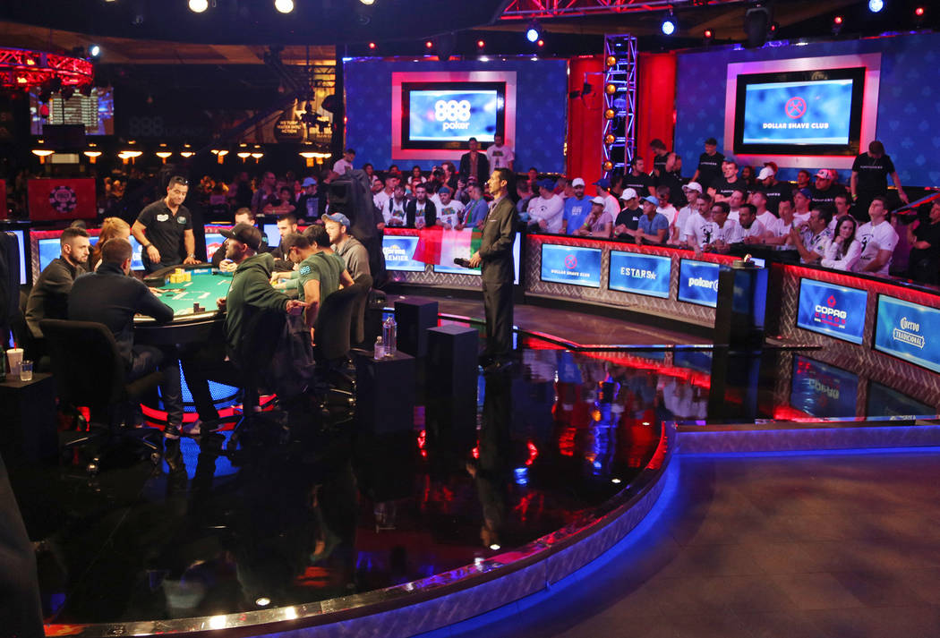 The main event final table of nine players during the World Series of Poker at the Rio hotel-ca ...