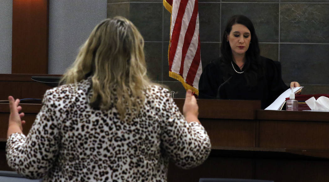 Review-Journal attorney Maggie McLetchie, left, talks as Justice of the Peace Harmony Letizia r ...
