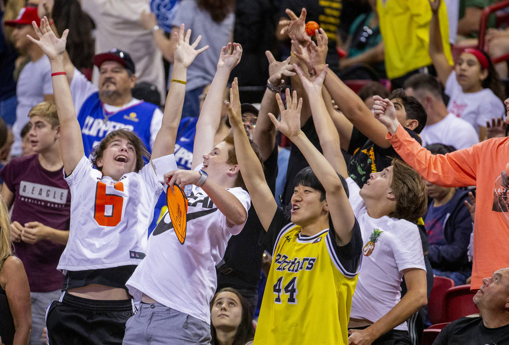 Fans get excited about catching a little basketball as the Memphis Grizzlies face the Minnesota ...