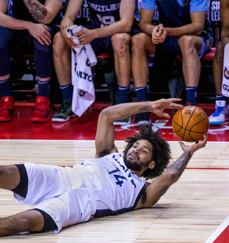 Minnesota Timberwolves forward Jordan Murphy looks to pass from down on the court versus the Me ...