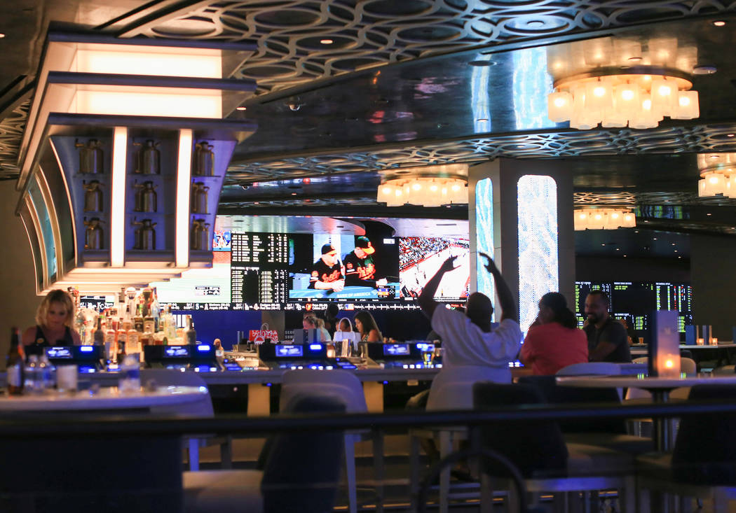 A newly renovated sports book can be seen from the a Taphouse bar at the Strat hotel casino in ...