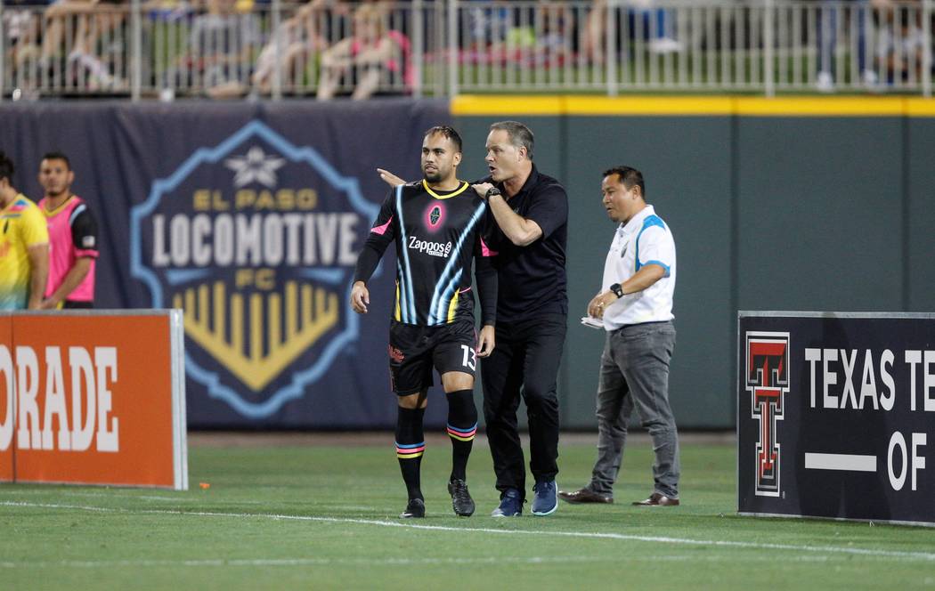 Jesus Gonzalez gets instructions from Lights FC coach Eric Wynalda prior to making his USL Cham ...