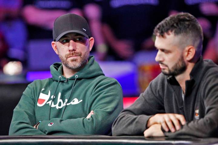 Garry Gates, left, and Alex Livingston, right, on the second day of the main event final table ...