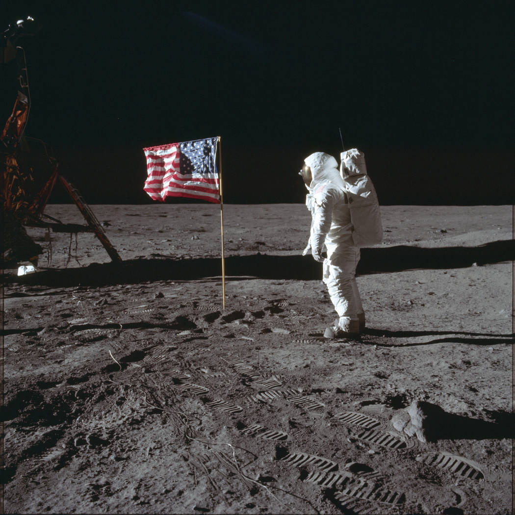 In this July 20, 1969 photo made available by NASA, astronaut Buzz Aldrin Jr. poses for a photo ...