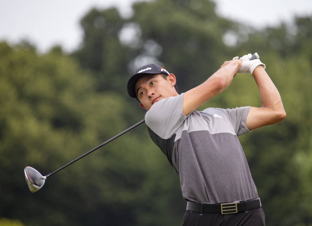 Collin Morikawa tees off on the first hole during the final round of the 3M Open golf tournamen ...