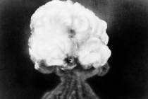 FILE - This July 16, 1945, file photo, shows the mushroom cloud of the first atomic explosion a ...